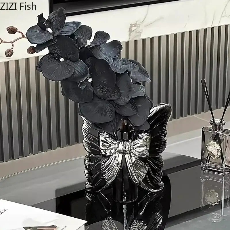 Modern white butterfly ceramic vase with pink bow decorbites butterfly ceramic adorned with black orchid flowers