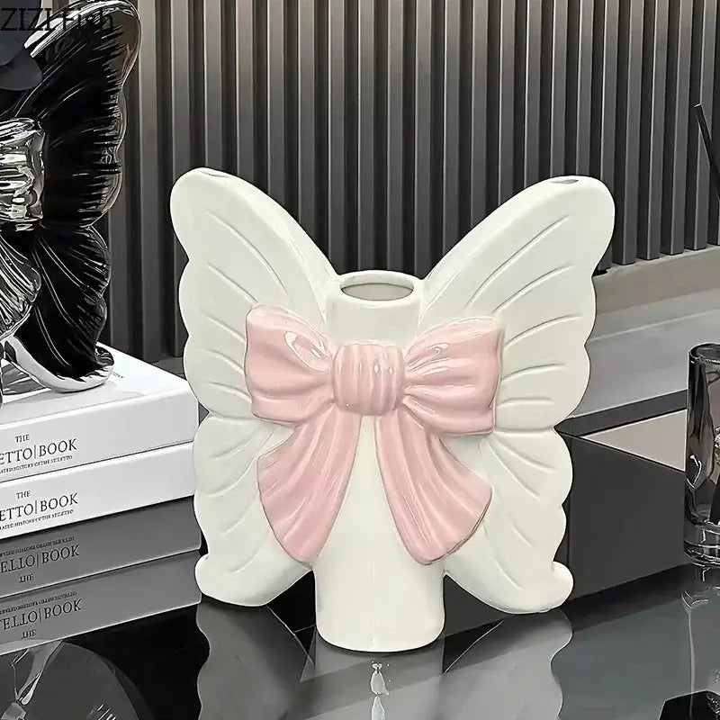 Modern white butterfly ceramic vase with pink bow detail perfect for decorbites butterfly ceramic flower arrangements