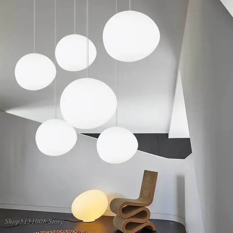 Modern white cascading glass pendant light with spherical matte finish glass pendant for dining room ceiling installation