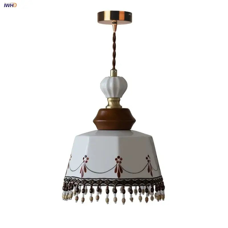 Modern white ceramic pendant light with brown wooden base gold-toned metal accents and beaded fringe decorbites copper wood led