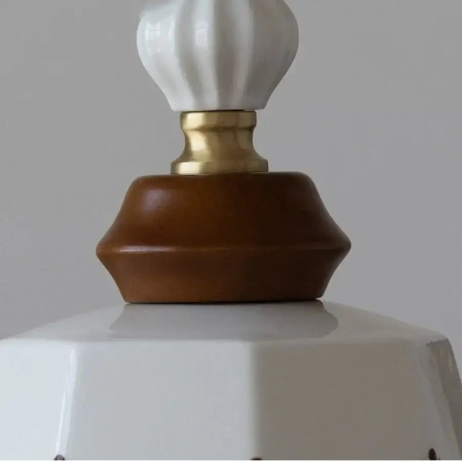 Modern white ceramic pendant light with gold-toned metal base and brown wooden accent for dining room decorbites copper wood decor