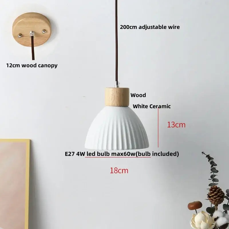 Modern white ceramic pendant light fixture with ribbed texture and natural wood top for kitchen decor