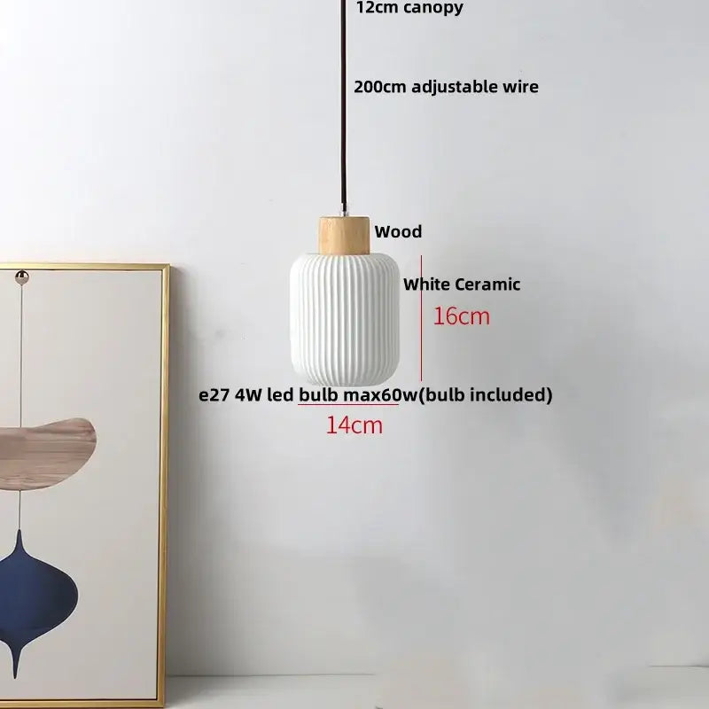 Modern white ceramic pendant light fixture with ribbed texture, wooden top cap, and adjustable wire suspension for kitchen decor