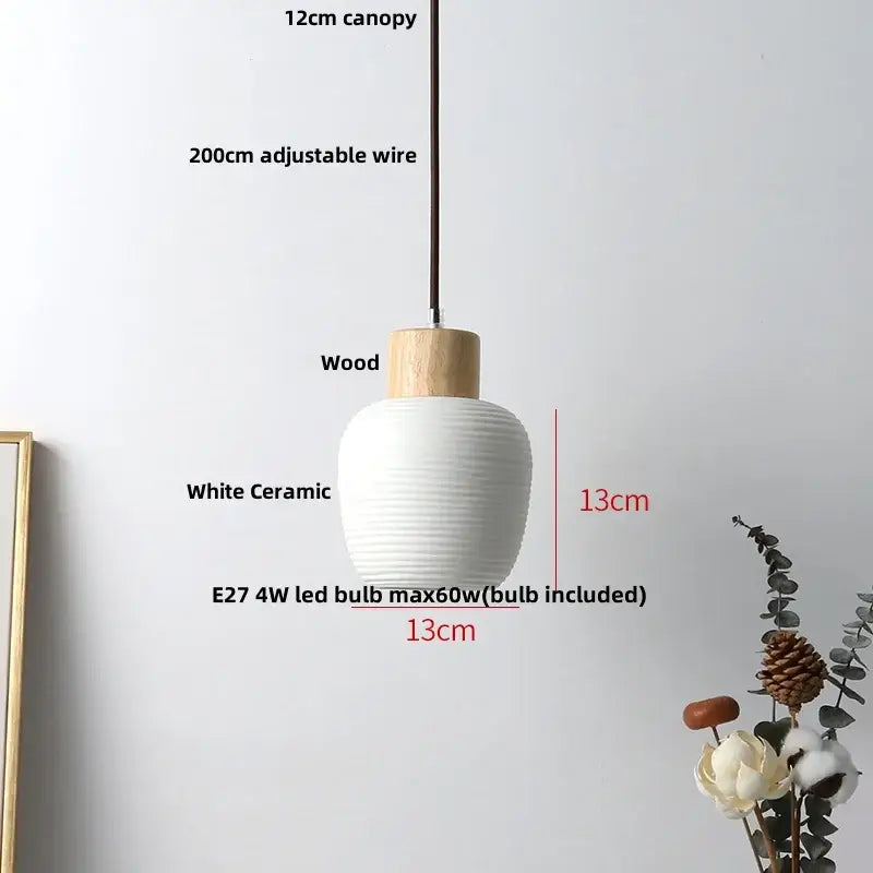 Modern white ceramic pendant light fixture with ribbed texture and natural wood top for kitchen decor