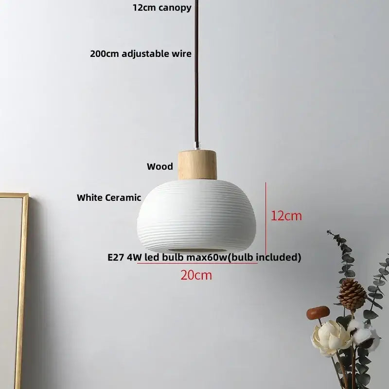 Modern white ceramic pendant light fixture with ribbed texture and wooden canopy for kitchen decor