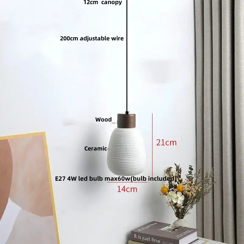 Modern white ceramic and wood pendant light fixture with ribbed texture for kitchen decor suspended by adjustable wire