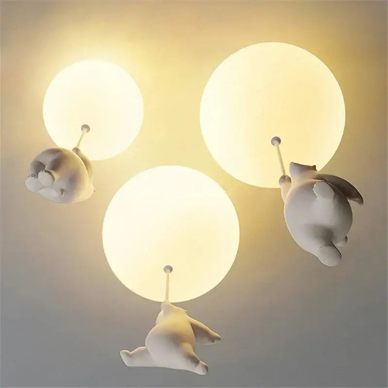 Modern white ceramic bear led ceiling light featuring three whimsical bear-shaped fixtures with glowing bulbs for kids bedroom