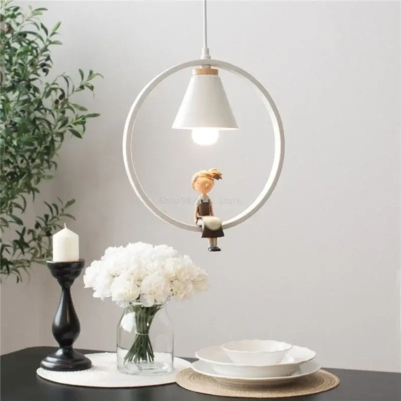 Modern white ceramic bird iron ring pendant light with a small figurine inside suited for bedroom decorbites iron ring pendant