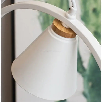 Modern white ceramic bird iron ring pendant light with white matte bell-shaped lampshade and wood collar decorbites iron ring pendant