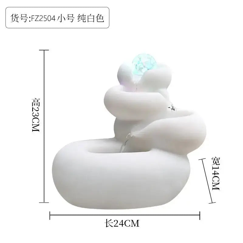 Modern white ceramic circulating water fountain with sculpted resin design and glowing blue crystal decorbites circulating water
