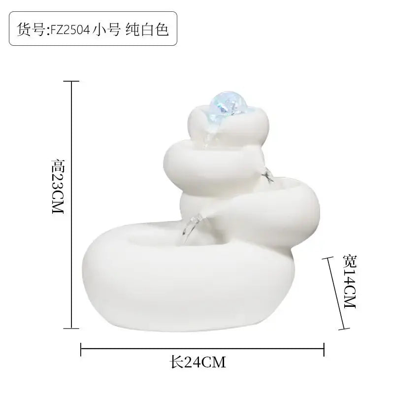 Modern white ceramic circulating water fountain with tiered rounded levels and clear crystal gem for living room decor
