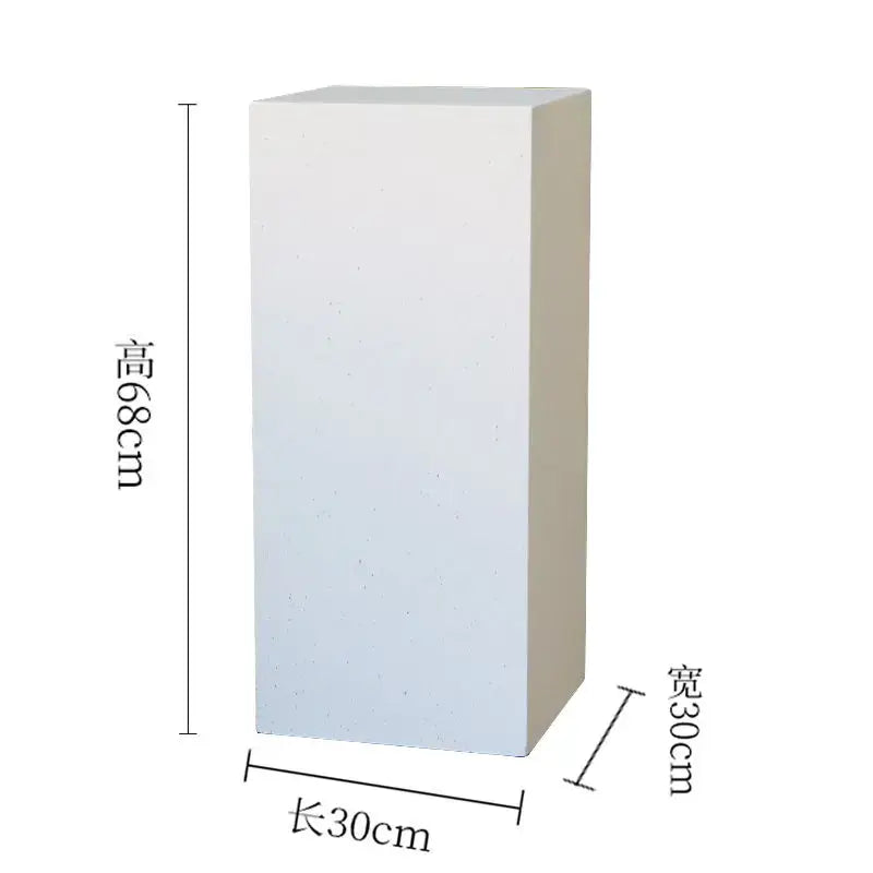 White ceramic circulating water fountain on a 68cm tall white rectangular display pedestal for modern living room decor