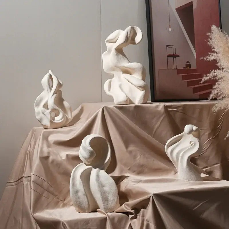 Modern white ceramic curl sculpture with flowing organic forms for elegant living room decor