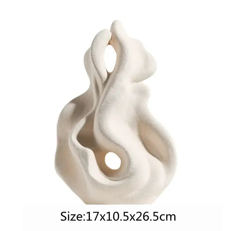 Cream-colored ceramic curl sculpture with flowing organic curves and hollow sections for modern living room decor