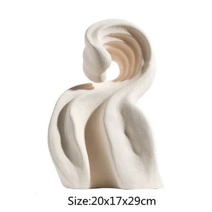 Modern cream-colored ceramic curl sculpture with flowing abstract swirls and smooth matte finish for living room decor