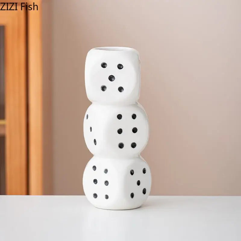 Modern white ceramic dice vase by decorbites shaped like three stacked dice with black dot patterns for living room decor