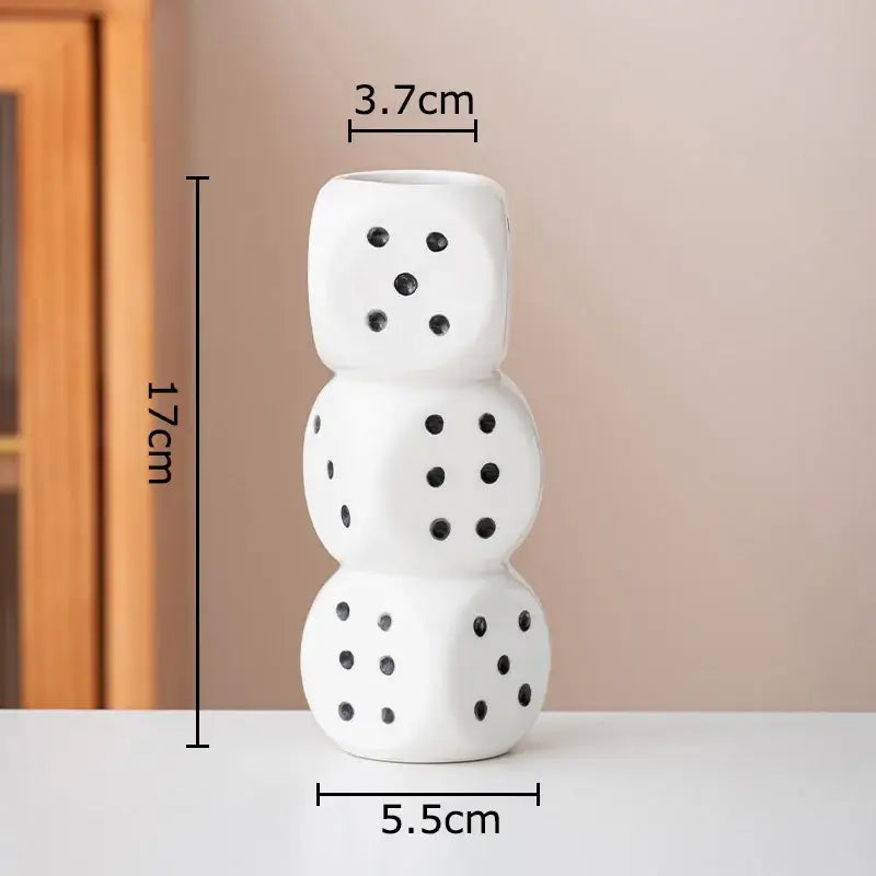 Modern white ceramic dice vase by decorbites shaped like three stacked dice with black dot details for living room decor