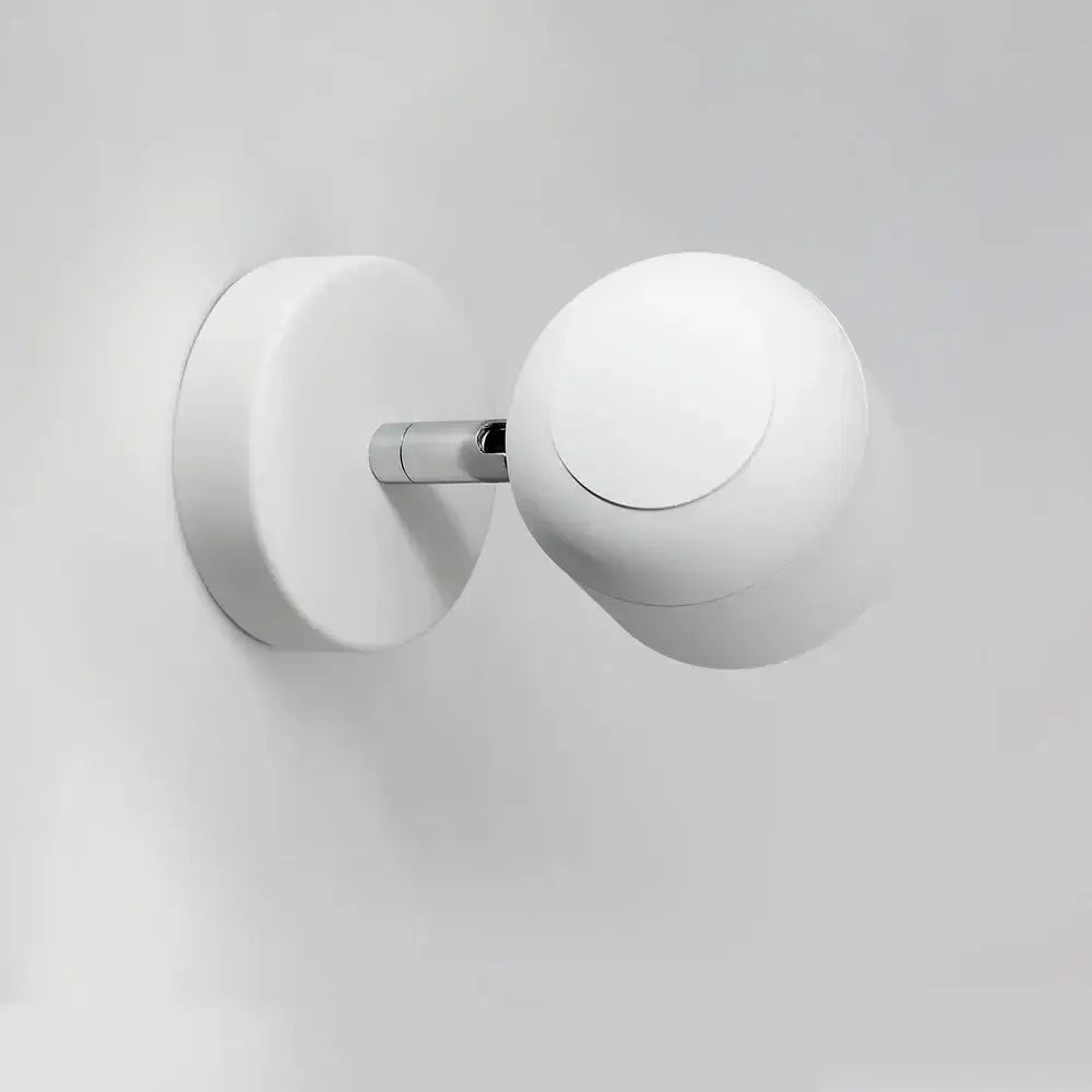 Minimalist white ceramic dimmable led wall lamp with a spherical shade and sleek chrome stem for bedroom reading decorbites dimmable led wall