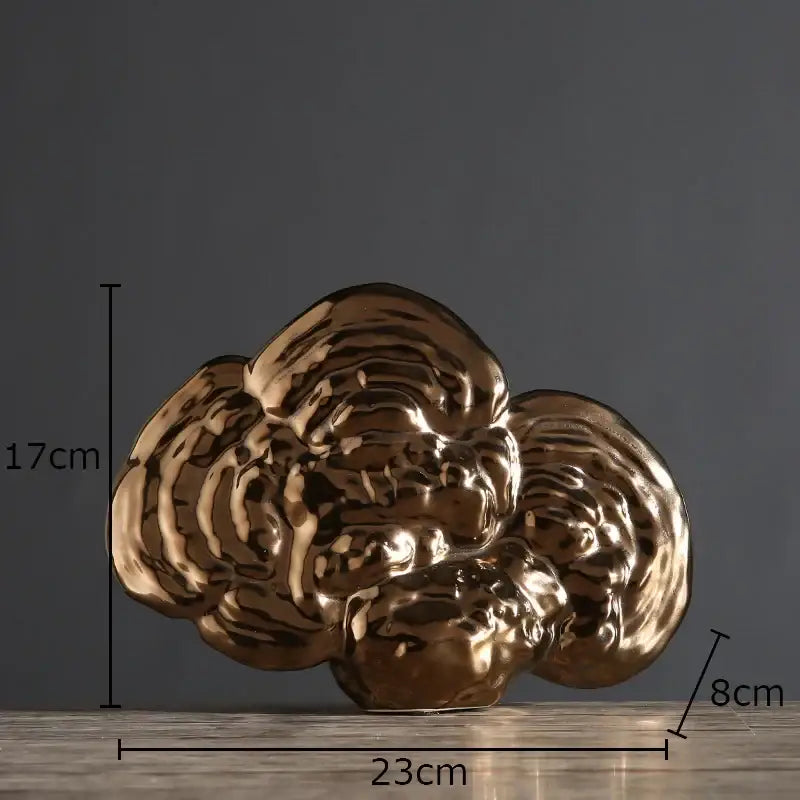 Shiny gold ceramic ganoderma lucidum sculpture with cloud-like abstract form for modern living room decor