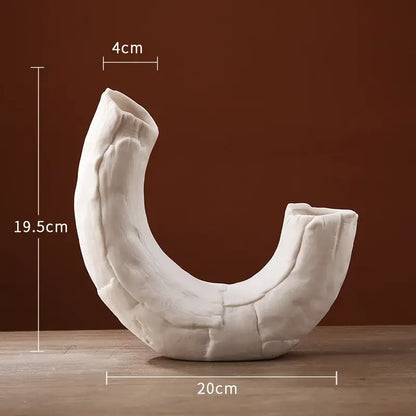 Modern white ceramic infinity symbol vase with textured cracked surface and two open ends for decorbites infinity decor