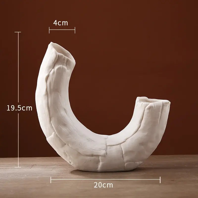 Modern white ceramic infinity symbol vase with textured cracked surface and two open ends for decorbites infinity decor