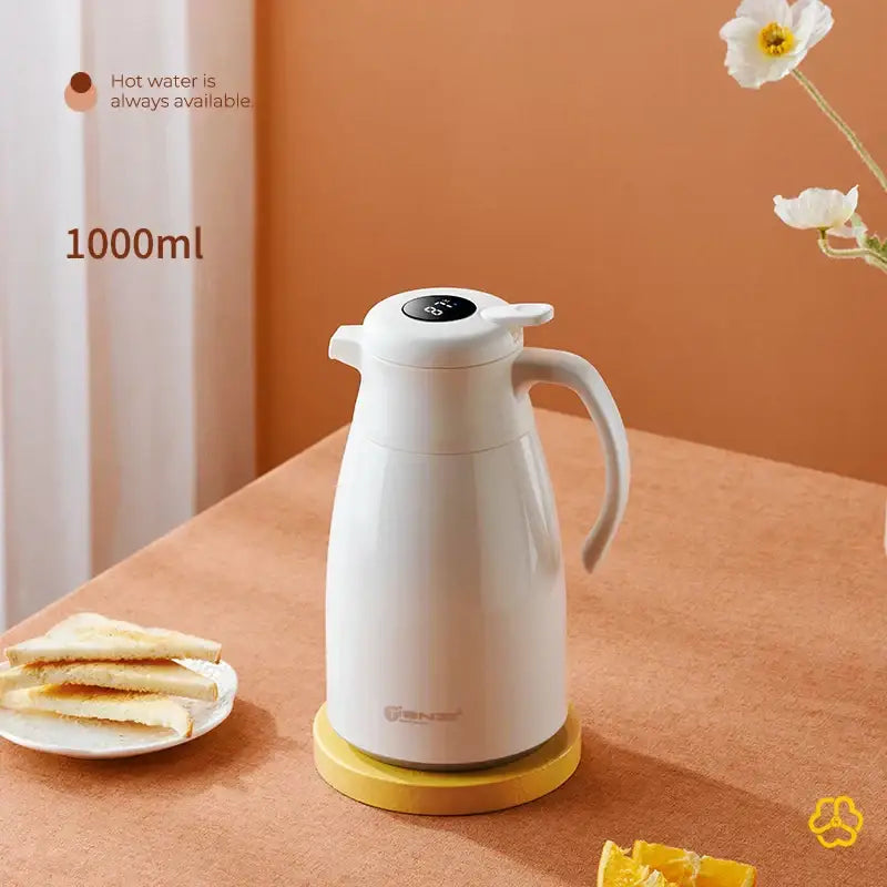 Modern white ceramic decorbites insulation kettle 1000ml digital thermos bottle with handle on yellow base