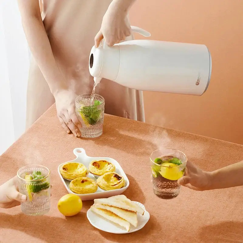 Modern white ceramic decorbites insulation kettle with digital thermal design and ergonomic handle for easy pouring