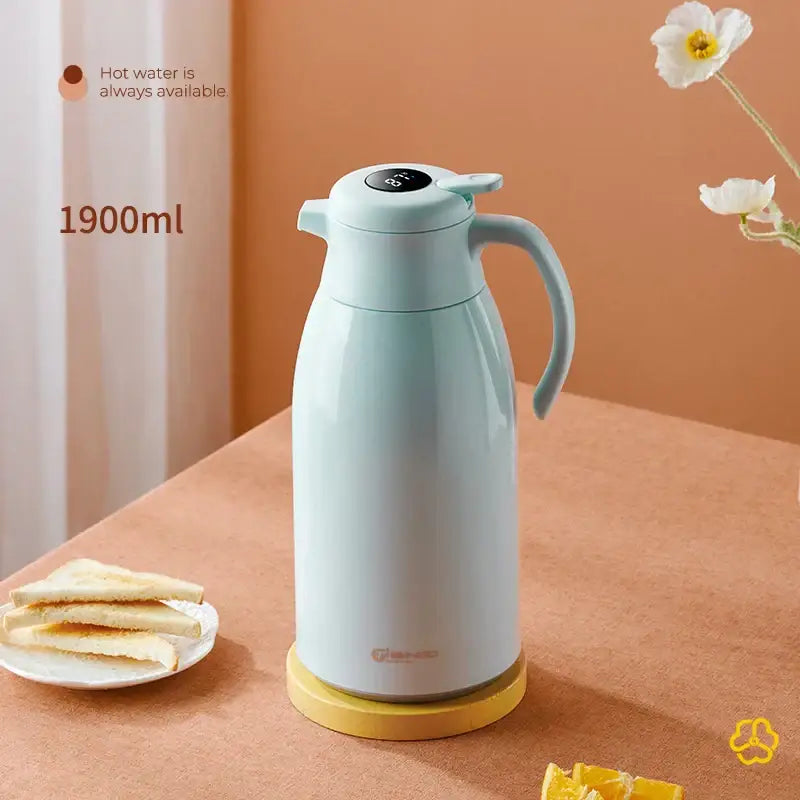 A sleek light blue 1900ml decorbites insulation kettle with digital display and ergonomic handle in ceramic design