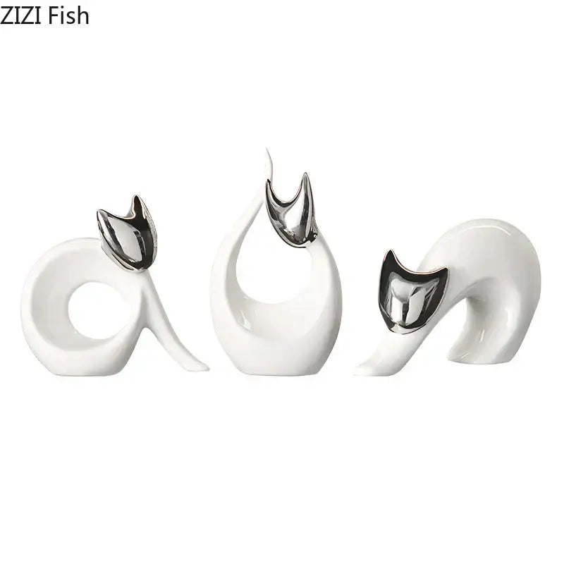 Set of three modern white ceramic kitten statues with polished silver metallic ears for living room decor
