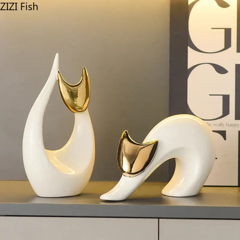 Two modern white ceramic kitten statues with gold ears featuring sleek glossy ceramic kitten design for living room decor