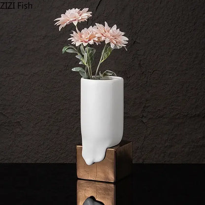 Modern white ceramic liquid vase with unique dripping design on bronze square base for stylish living room decorbites ceramic liquid decor