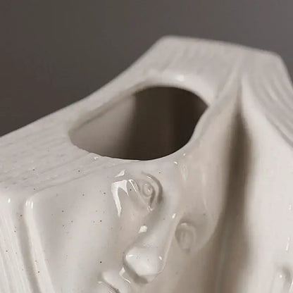 Modern white ceramic man face tissue box with sculpted decorbites ceramic man design for living room decor