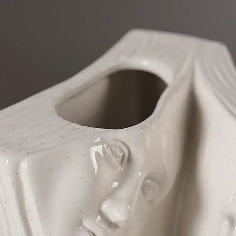 Modern white ceramic man face tissue box with sculpted decorbites ceramic man design for living room decor