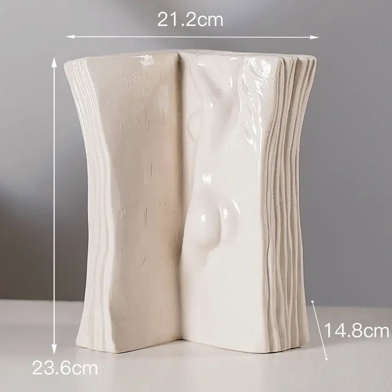 Modern cream-colored ceramic man face vase with textured ridges for living room decor and storage by decorbites ceramic man