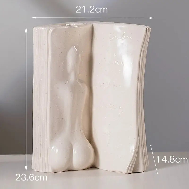 Cream-colored ceramic man face book vase with sculpted figure for modern living room decorbites ceramic man decor