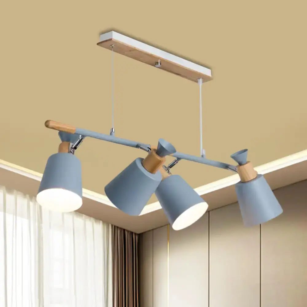 Modern island light with four adjustable tapered shade bulb bases in blue-gray metal and natural wood on wooden bar