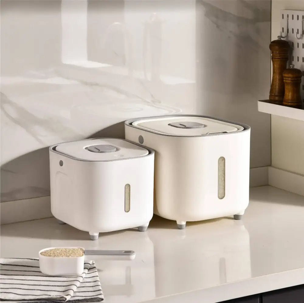 Modern white ceramic food storage container with sleek silver lids and transparent windows for rice and grains storage