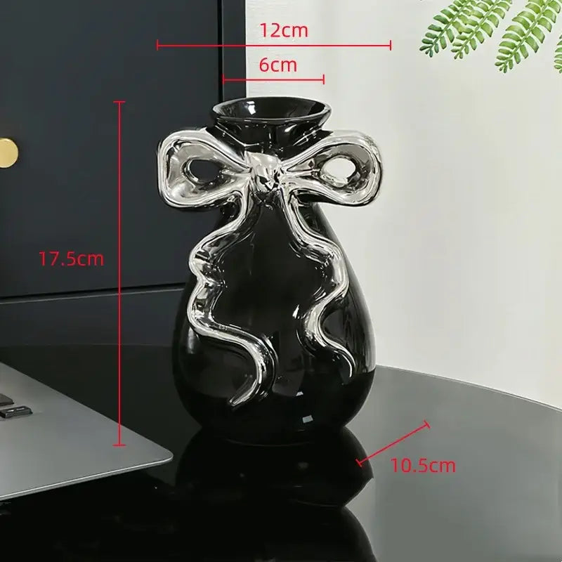 Black ceramic vase with glossy finish and ornate silver cute bow decorbites 3d ribbon for living room decor