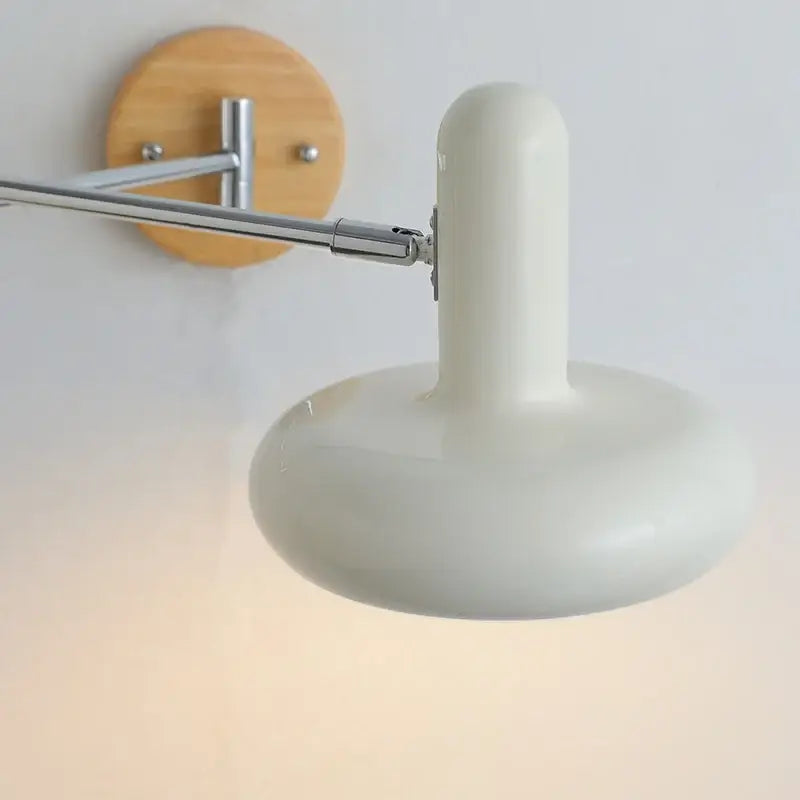 Modern white ceramic wall lamp with cream iron art chrome arm and wooden backplate for bedroom decorbites cream iron design