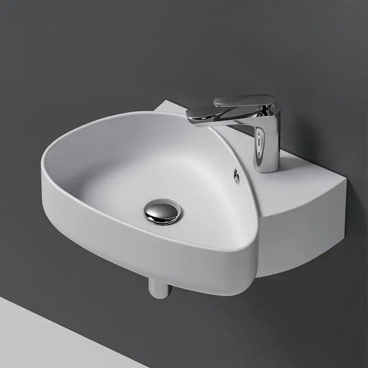 Modern white ceramic wall mounted wash basin bathroom sink with a sleek chrome faucet for stylish ceramic wall decorbites