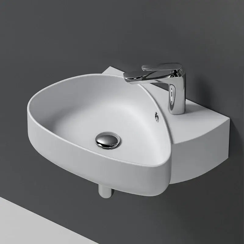 Modern white ceramic wall mounted wash basin bathroom sink with a sleek chrome faucet for stylish ceramic wall decorbites