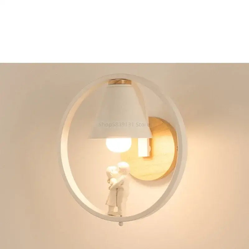Modern white child figurine led wall lamp with wooden backplate and embracing people figurine for bedroom wall lamps