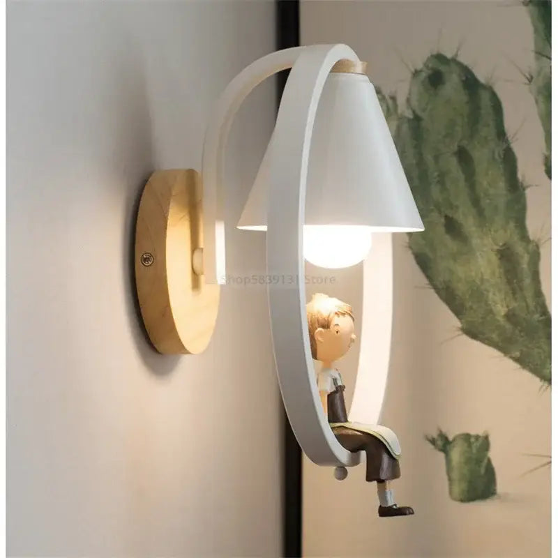 Modern white child figurine led wall lamp with curved wood arm and illuminated cone-shaped shade for bedroom use