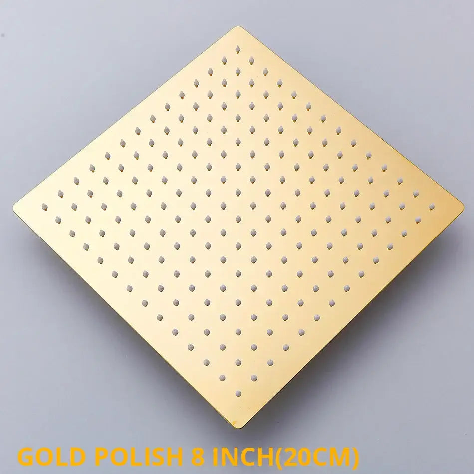 Modern white chrome square rainfall shower head with gold-polished finish and evenly spaced perforations for rainfall shower