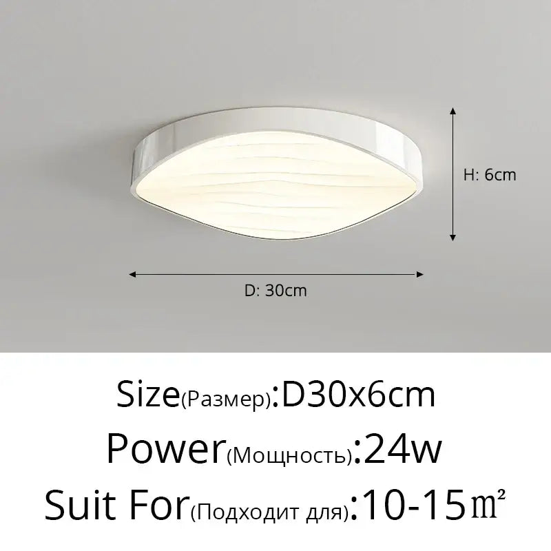 Modern white led circular chandelier with sleek oval design and subtle horizontal ridges for elegant dining room decorbites circular chandelier
