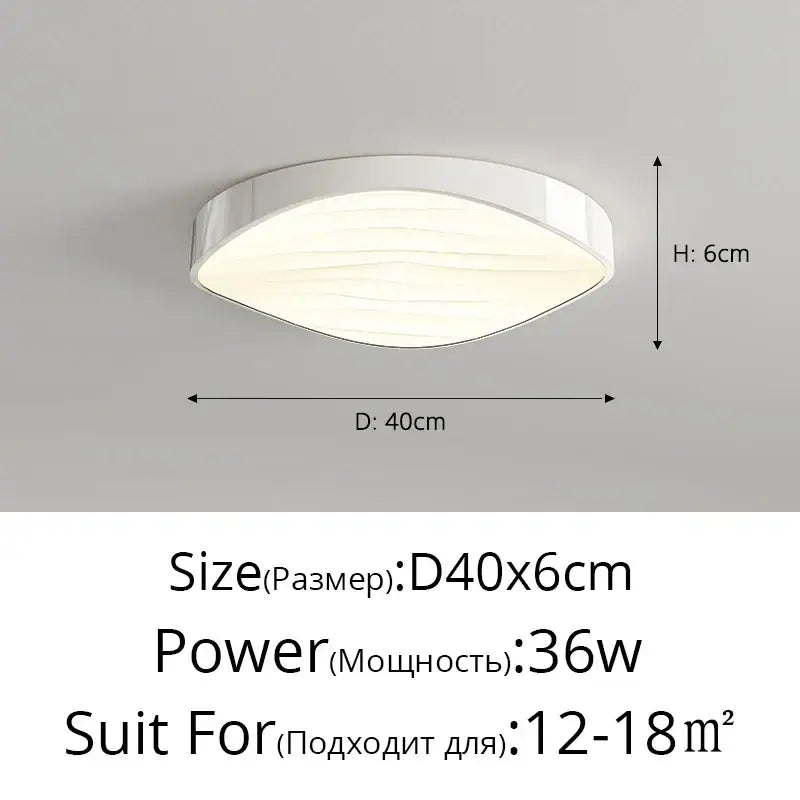 Modern white circular chandelier with sleek oval led light and wave textured diffuser for dining room decorbites circular chandelier