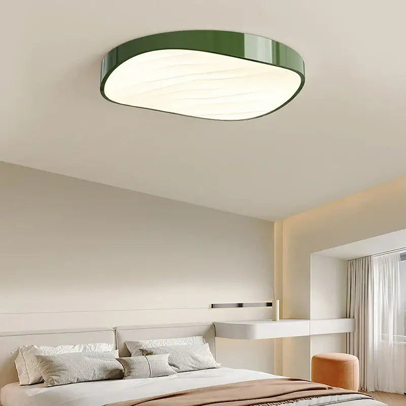Modern white circular chandelier with a sleek green frame and soft white diffused light ideal for dining room decorbites circular chandelier
