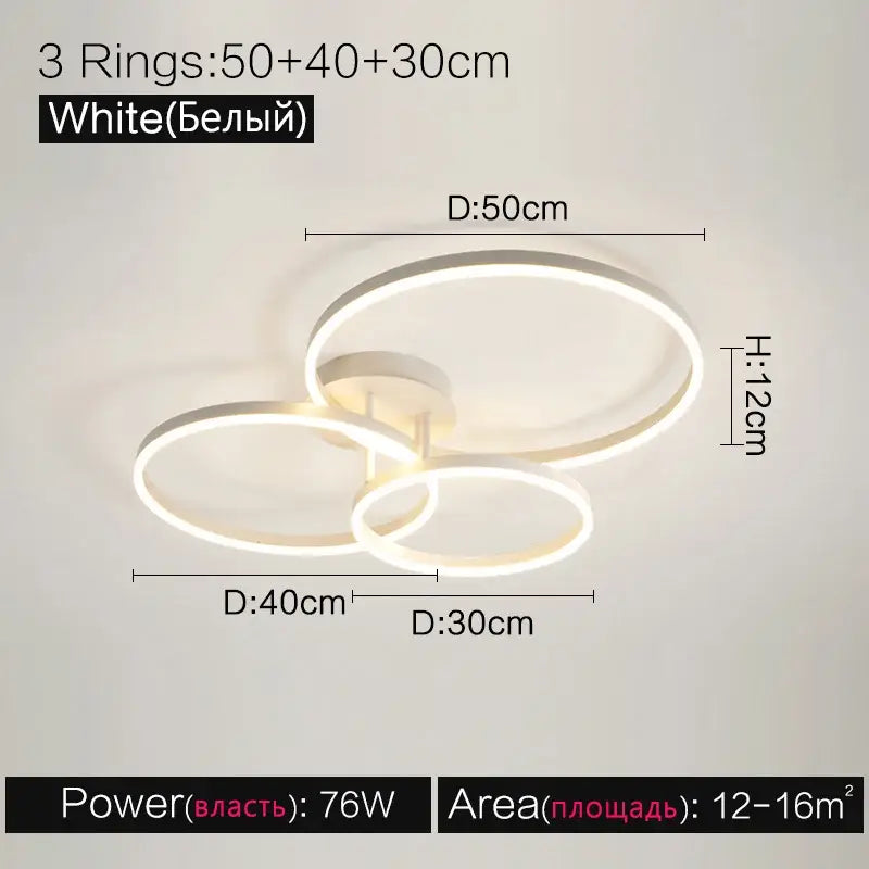 Modern white decorbites ceiling lamp with three interlocking circular led rings in a bedroom ceiling lamp set