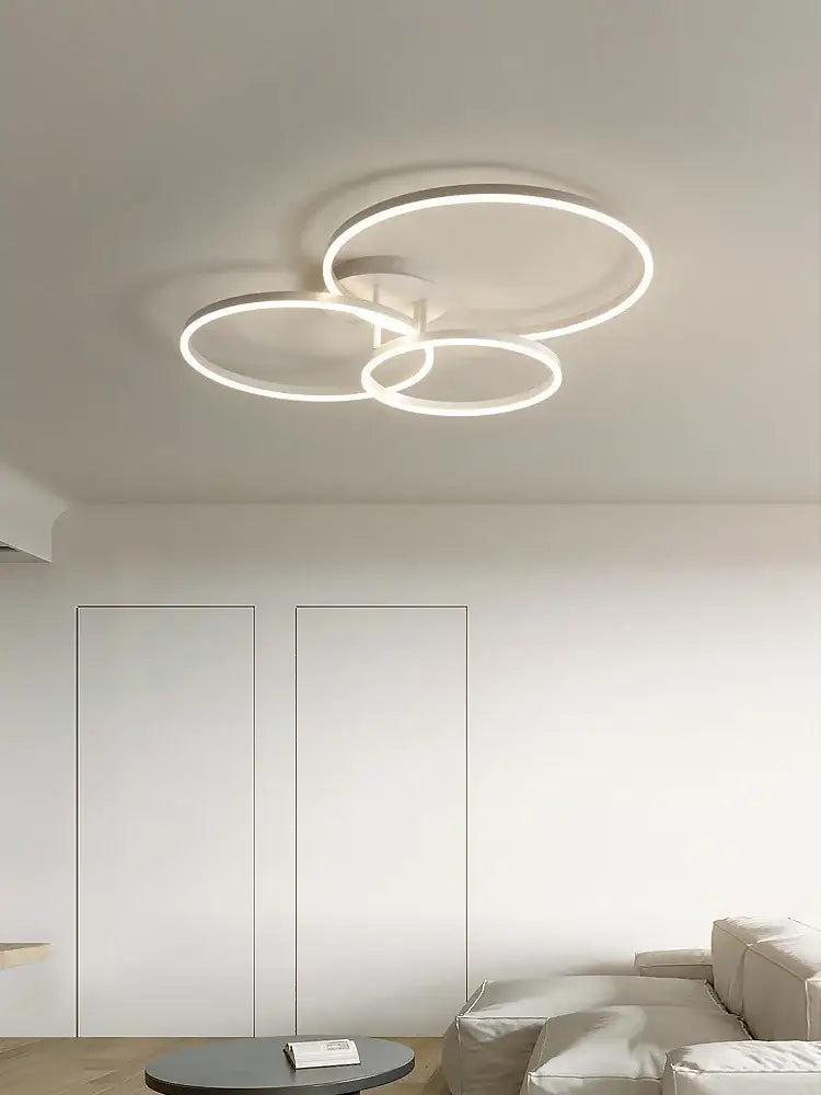 Modern white circular led decorbites ceiling lamp set with three interlocking rings for bedroom lighting