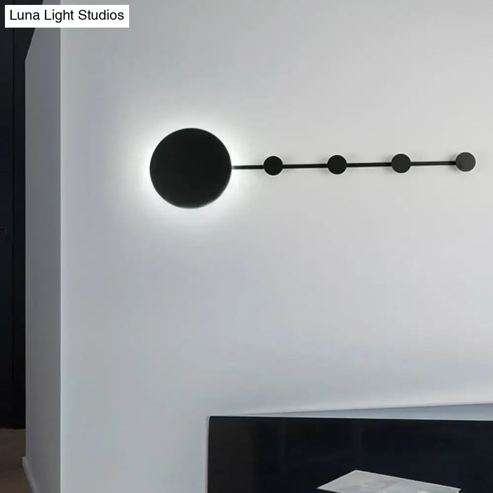 Black minimalist wall lamp with circular led light source and five spherical accents bulb included modern light fixture